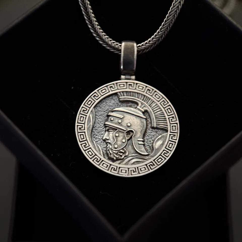 Silver pendant with  Marcus Aurelius warrior design on a black background